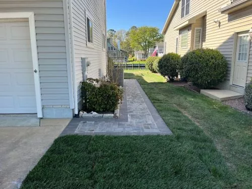 They installed a sidewalk and it is beautiful! Looks even better in person - neighbors stop by to check it out